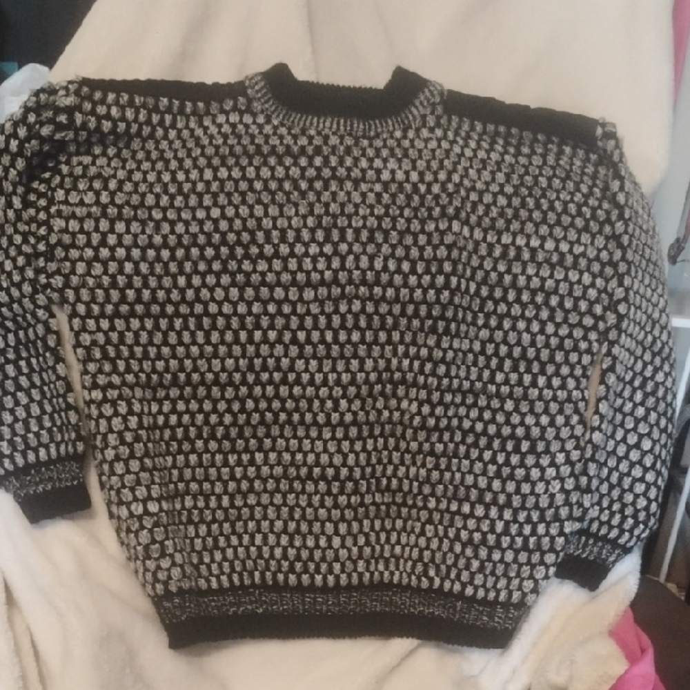 Chia Black and White Knit Sweater With Suede Shoulder Bars.